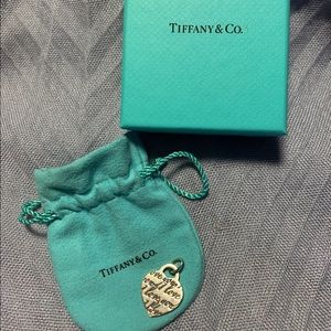Tiffany & Co. “I love you” heart tag pendant